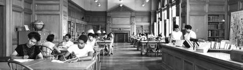 black and white photo students in archives